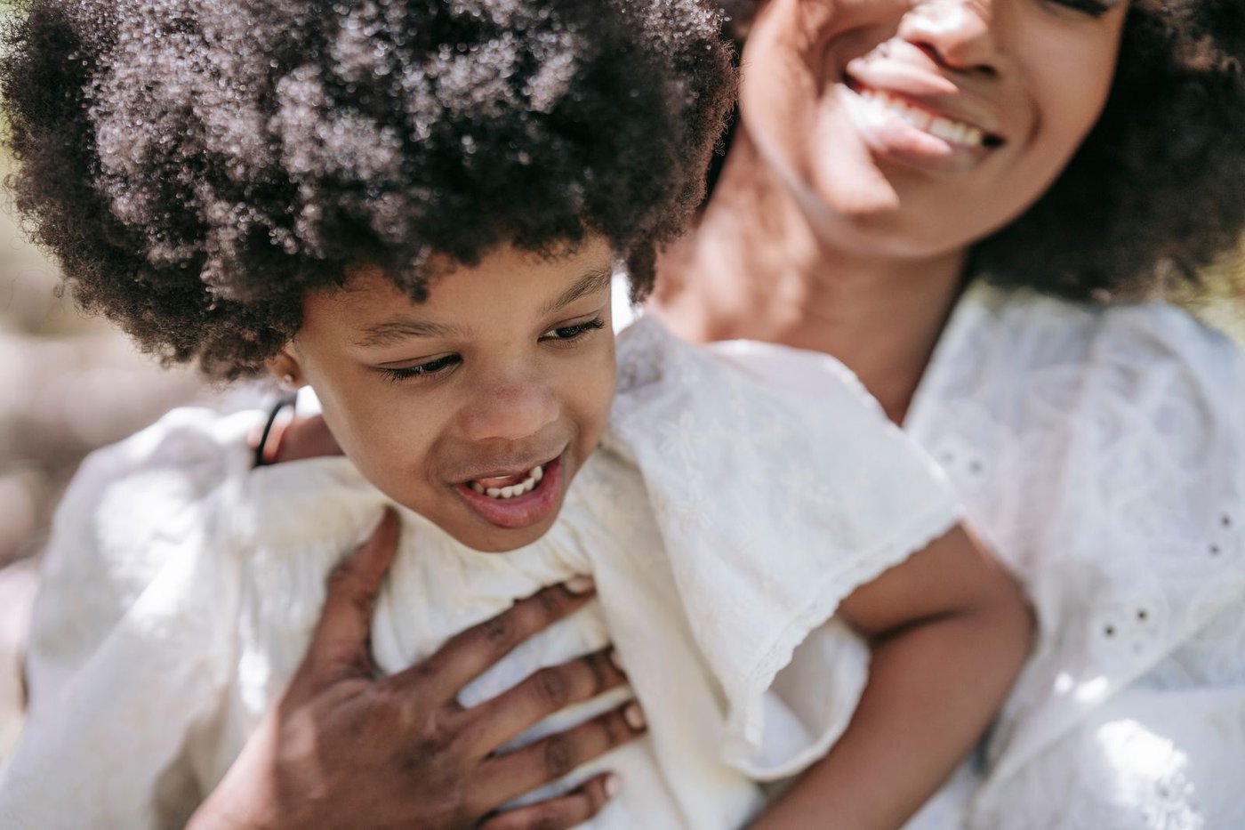 Black family embracing together